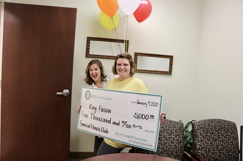 eCO Marketing Director and Clay Branch Manager prepare to surprise the $5,000 winner.