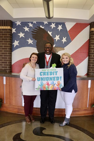 Trisha Bowman and Hope Finley pose with Van Phillips