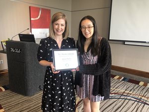Scholarship recipient, Jessica Bradley, smiles with eCO Credit Union Marketing Director, Melissa Stewart.