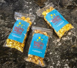 Three bags of Naughty But Nice Kettle Corn
