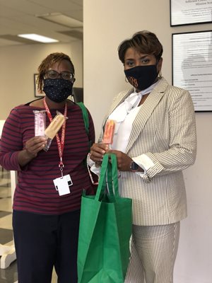 Board Members enjoy Frios Pops