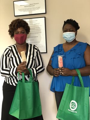 Board Employees enjoy Frios pops